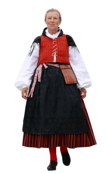 Pukuun kuuluu valkoinen esiliina (ks. kuva alla). Viime keväänä hankin mustan silkkiesiliinan. Tällä hetkellä kudon verkkopitsiä (ks. seuraava sivu) tanun reunapitsiksi.