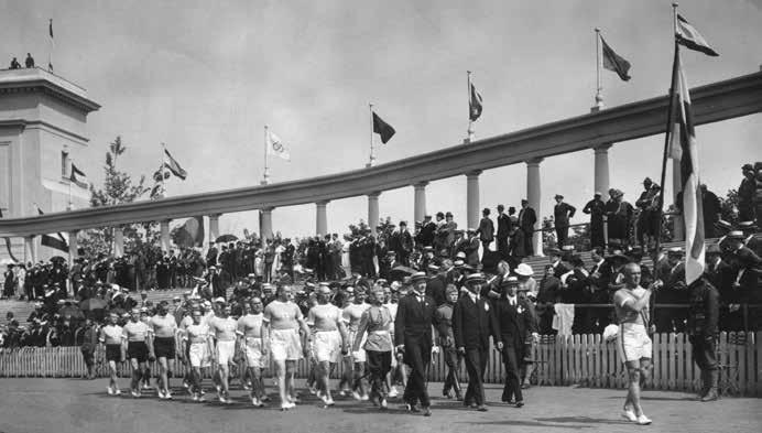 Lippu jääkärille Itsenäisen Suomen ensimmäiseen olympiajoukkueeseen Antwerpenissa 1920 kuului suurnimiä Hannes Kolehmaisesta lähtien.