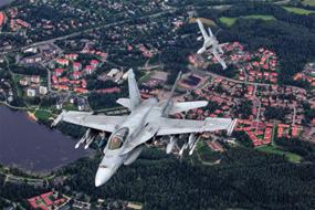 TEEMANA EMANA MONITOIMIhävITTäJä F/A-18-monitoimihävittäjä varustettuna Sidewinder 9X, AIM-120 AMRAAM ilmasta ilmaan -ohjuksilla, JDAM-täsmäpommilla ja JSOW-rynnäkköohjuksella.