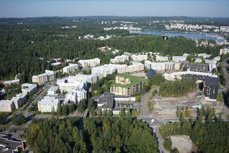 Havainnekuva Tahkonkaarelta perustelemaan kirkon viereisen rakennuksen Athoksen mittakaavaa ja sijoitusta olisi ollut toivottava.