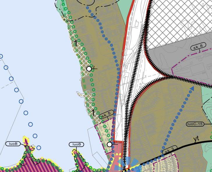Tahiniemen kaupunginosan poikki on osoitettu viheryhteystarve (vihreä katkoviiva) sekä maakunnallisesti ja