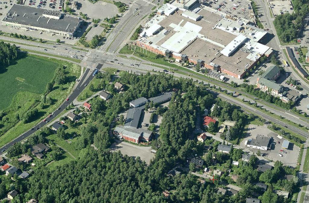 3 3. LÄHTÖKOHDAT 3.1 Selvitys suunnittelualueen oloista Alueen yleiskuvaus ja rakennettu ympäristö Suunnittelualuetta hallitsee n.