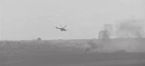 TeeMANA emana UhkAJäRJesTeLMäT MI-24P tukee hallituksen hyökkäystä Kafir Naboudah:n viljasiilojen alueella (kuvalähde: Youtube, geolokaatio artikkelin kirjoittaja) kuljetushelikopteria ammuttiin