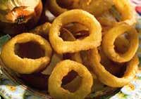 180 C SALUD BEER BATTERED ONION RINGS Kokonaisesta sipulista valmistettuja, oluessa marinoituja, paneroituja sipulirenkaita. n. 37 kpl/kg.