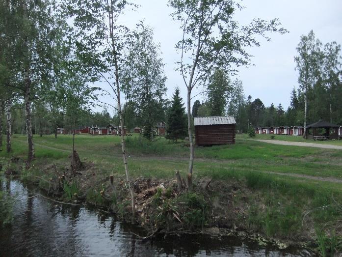 Sivu 3/ 14 Bilder: Nuvarande campingområde och Runebergs stuga.