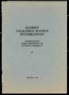 Ritarikunnan ohjesääntöön maininta I luokan mitalista kultaristein lisättiin vasta vuoden 1936 uudistusten yhteydessä.