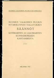 Suomen Valkoisen Ruusun ritarikunnan vuonna 1926 käyttöön otettu Carolus Lindbergin suunnittelema kotelotyyppi.