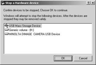 Macintosh Näytölle ilmestyy turvallista-irrottaa-laite (safe-to-removehardware) -ikkuna. Näpäytä OK. Irrota USB kaapeli ja sammuta sitten kamera.