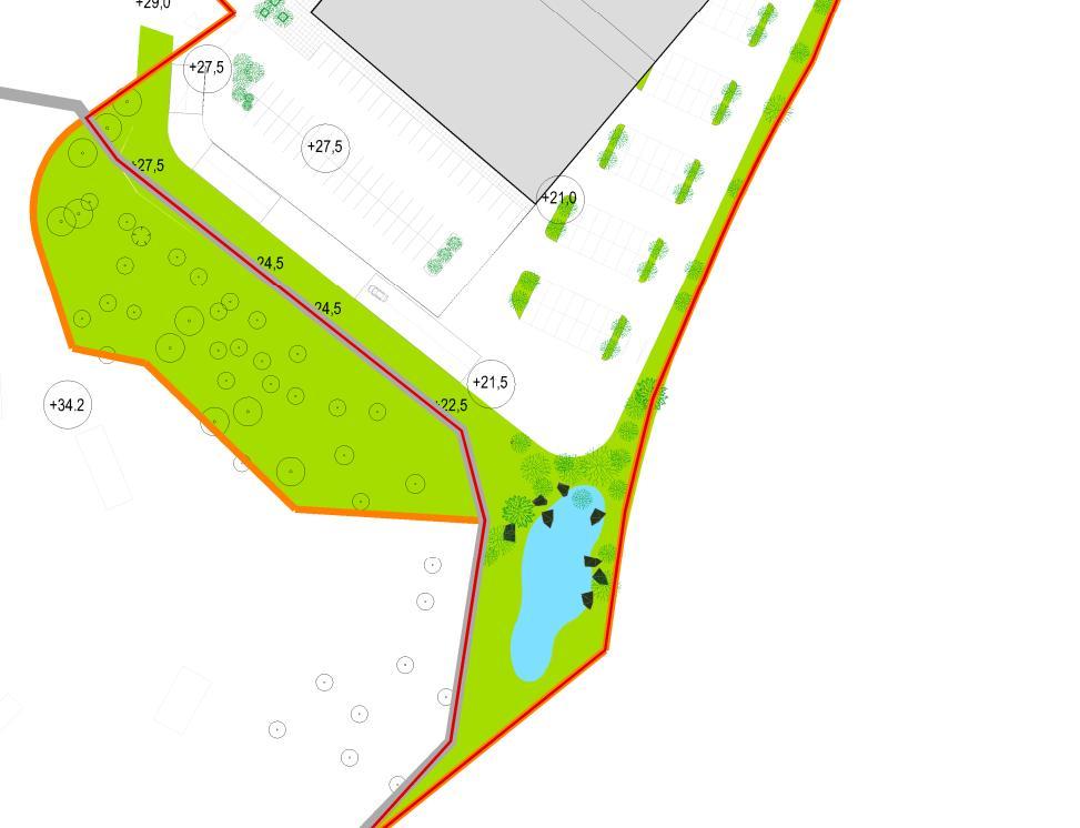 Eteläpuolella on kallioinen metsä ja sen takana omakotitaloja ja Helsinki-Turku -moottoritie.