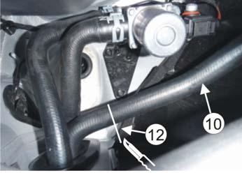 The free pipe stub pointing to the right. Fit the hose (7) 70x70mm onto the heater (6). Fit the angle joint piece () in the hose (7). Split the tube () holding the hoses together. Note!