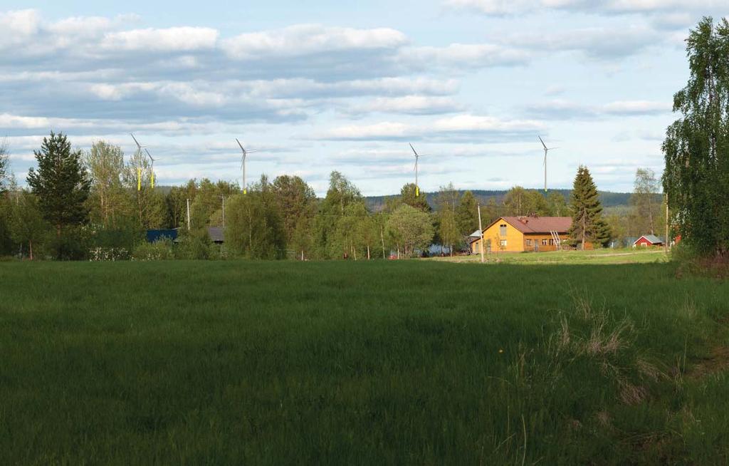 Havainnekuva, jossa tuulivoimalat ja niiden osat, jotka jäävät maaston ja metsän taakse, on koroste u keltaisella värillä.