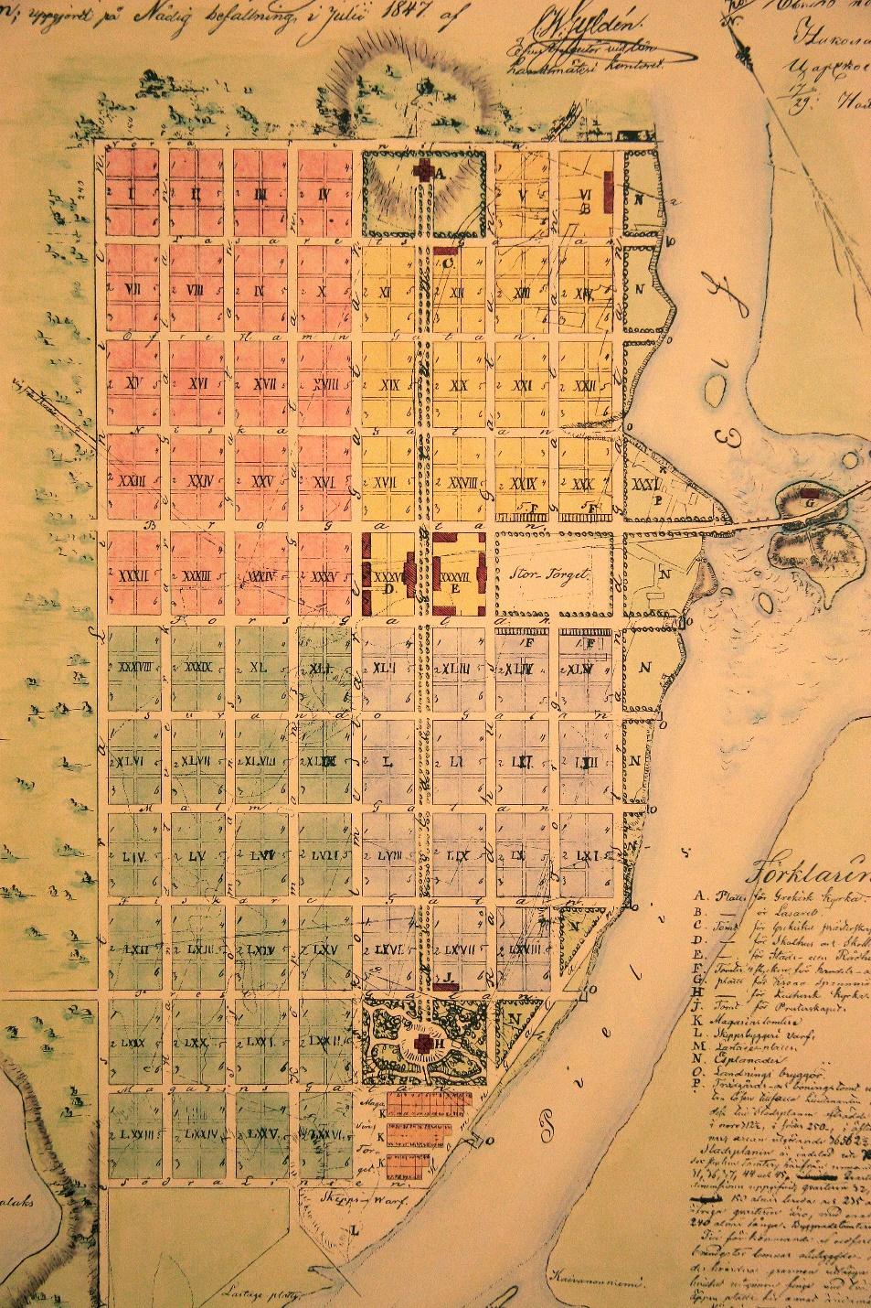Claës Wilhelm Gyldénin laatima Joensuun asemakaava 1848. Gyldén jakoi ruutuasemakaavaalueen neljään kaupunginosaan, jotka näkyvät kartassa eri väreillä. Kuva: JKKA.