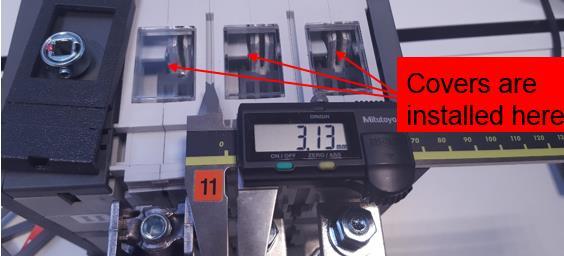 other. When mounting the covers between each other it is essential for the combined cover walls to not exceed the theoretical max measurement, 3,13 mm, between the poles (figure 35).