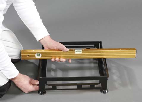 ENG Installation of Rae sauna heaters 1. Turn each of the adjustable feet of the base frame clockwise as far as it will go. 2.
