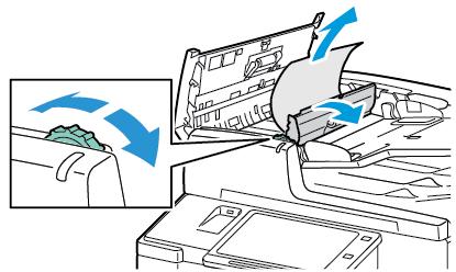 Käännä vihreää pyörää kuvan osoittamaan suuntaan siirtääksesi originaalin pois syöttölaitteesta. Poista juuttunut asiakirja varovasti. 6.
