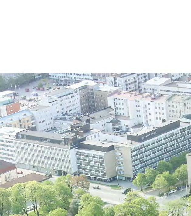 arkiston aineistoa. Tietopalvelupisteen kautta vierailijat siirtyvät avoimen varaston tiloihin (.