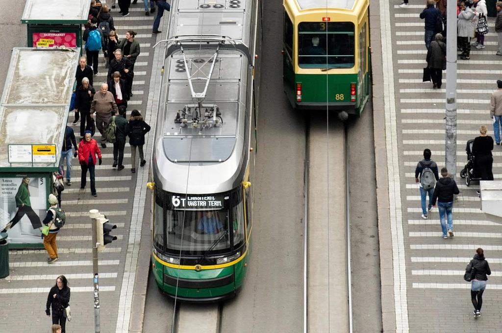 laiturikuulutukset Raitiovaunujen oviliuskojen lukituksen avauspyyntöpainikkeen sijoittelu ja erottuminen