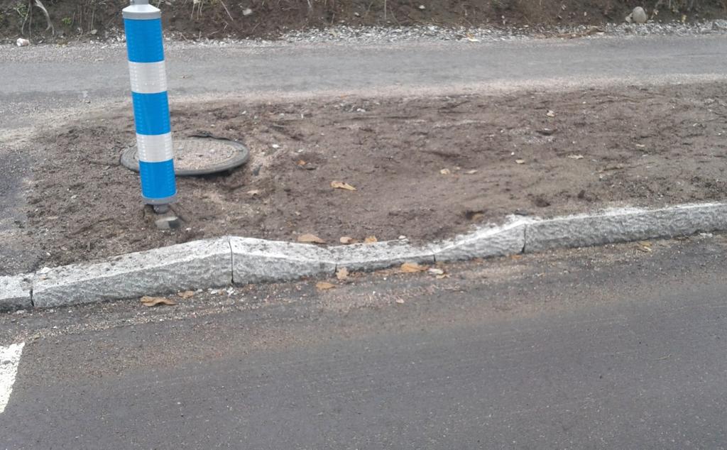 26 Kuva 39. Kyösti Kallion kadun kahdessa hulevesitaskussa vesi ohjattiin taskuun madallettu reunakiven kautta.