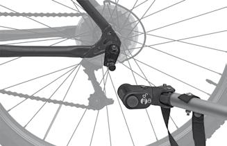Croozerin muuttaminen pyöräilykärryksi Akselikytkimen asennus polkupyörään Akselikytkin asennetaan aina ajosuuntaan katsottuna polkupyörän vasemmalle puolelle.