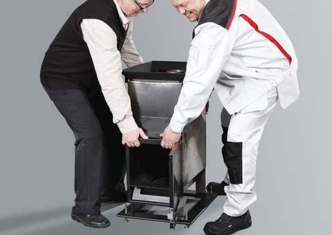 Lift the stove into position by grabbing hold of the stove frame at the back and the top of the door frame at the front. 2. Level the stove using a spirit level and by adjusting the legs. 3.