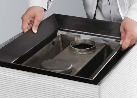 Put the sauna stones in place as instructed on page 28. Connect the sauna stove to the flue as instructed on page 15. RUS 9. Ослабьте 4 винта рамки емкости для камней. 10. Снимите рамку. 11.