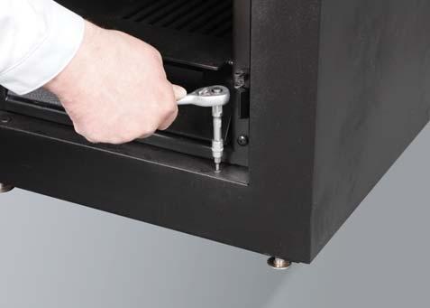 Remove the upper and lower screws (four screws) in the firebox door frame. Unscrew the six screws on the stove s rear panel. 9.