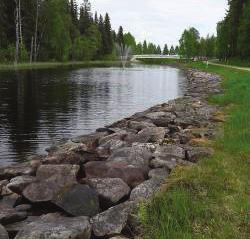 Kuva: Karhunpäälusikka (KM 21493:1) Humppilan Järvensuon kivi-/ varhaismetallikautiselta järviasuinpaikalta. Kuva: Ritva Bäckman, Museovirasto.