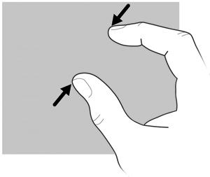 Puristaminen: Voit loitontaa asettamalla kaksi sormea näytölle erilleen ja sitten pienentää kohteen kokoa vetämällä sormet yhteen.