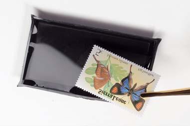 HUOM: Laita postimerkki takaisin kan sioon vasta kun se on kokonaan kuivunut! Til.no.