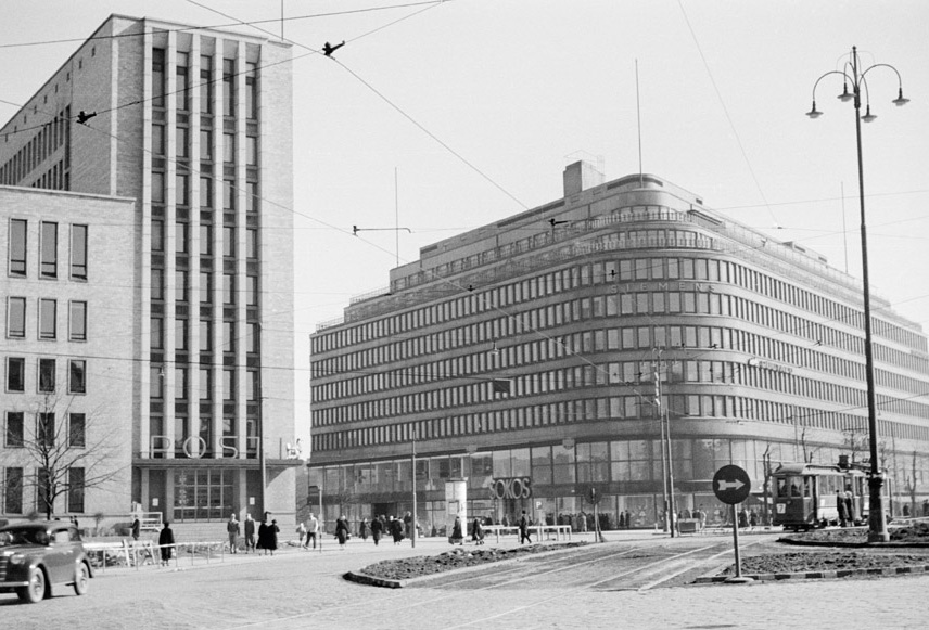 KATUOSOITE: MANNERHEIMINTIE 9 KÄYTTÖÖNOTTOVUOSI: 1952 KIINTEISTÖTUNNUS: 091-002-0099-0013 PYSYVÄ RAKENNUSTUNNUS: 405 SUUNNITTELIJA: ERKKI HUTTUNEN RAKENNUTTAJA: OY SOKOS AB ALKUPERÄISKÄYTTÖ: LIIKE-,