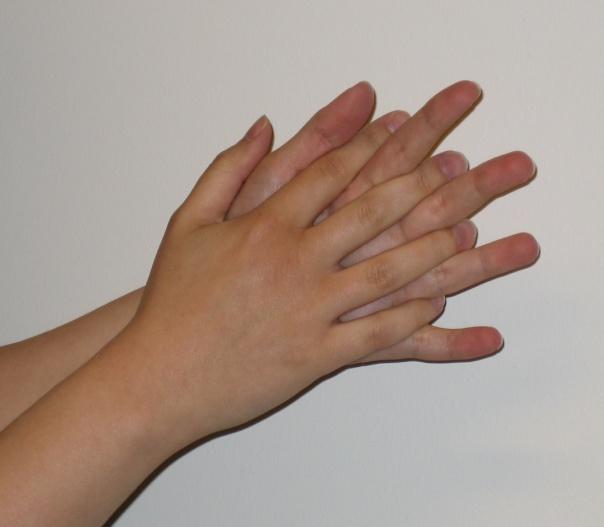 1. Hiero sormenpäät toisen käden kämmentä vasten. 2.
