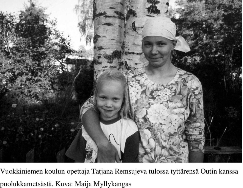 tyttärensä Outin kanssa