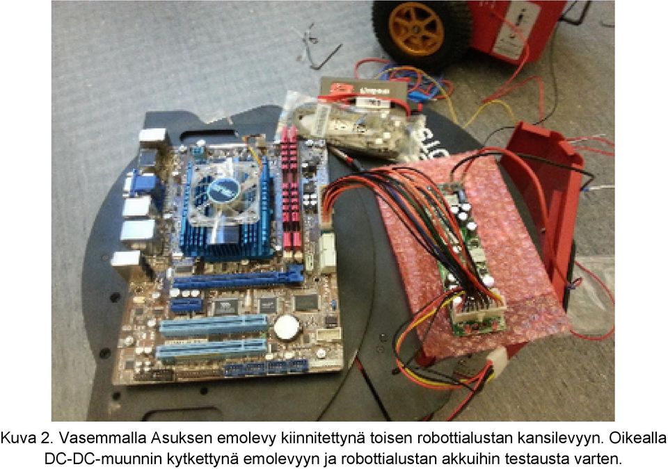 toisen robottialustan kansilevyyn.