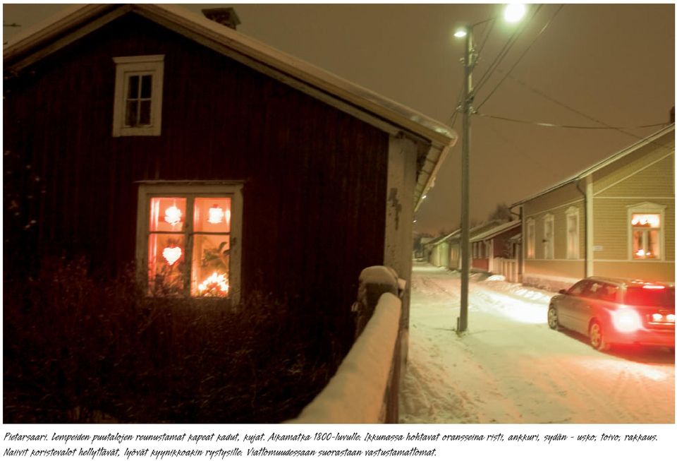 Ikkunassa hohtavat oransseina risti, ankkuri, sydän - usko, toivo,