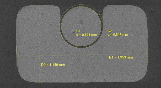 4.2. Käämien rakenne 38 Kuva 4.3 Eristämättömän johtimen poikkileikkaus. 1,199 mm. Ydinlanka on myös Formvar-eristetty ja eristyksen paksuus on noin 10 µm. [1, s. 29] Kuva 4.