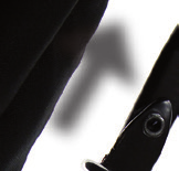 ENG To fold the pushchair, push the chassis locks up along
