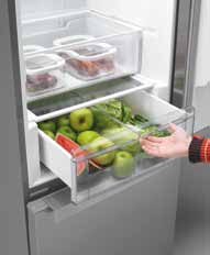 OVENS Fagor jääkaappien vihanneskorit on varustettu ohjaimilla, jotka mahdollistavat laatikon avaamisen ja sulkemisen helposti liu uttamalla.
