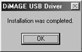 AUTOMAATTINEN ASENNUS Aseta DiMAGE ohjelmiston CD-ROM-levy CD-ROM-asemaan ennen kameran liittämistä tietokoneeseen. DiMAGE asennusohjelman pitäisi käynnistyä automaattisesti.