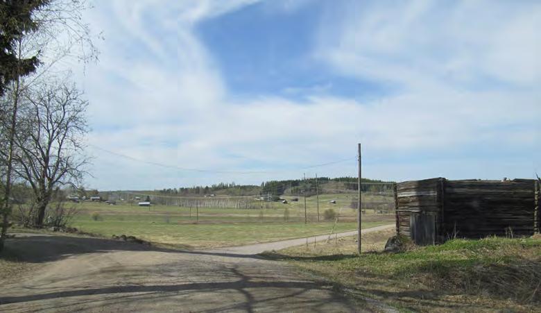rakennuksineen Rautjärven kirkon ja hautausmaan ympäristö ja ranta-alue.