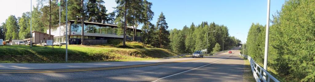 Näkymä Sairaalantien ja valtatie 15 risteysalueelta kohti Jokelan maantiesiltaa. Kuvan oikeassa reunassa oleva viheralue on osittain yleisentien aluetta.
