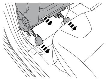 18 Väännä kuljettajan istuimen takakiinnitysten peitekotelot varovasti irti lastan avulla. Irrota ruuvit.