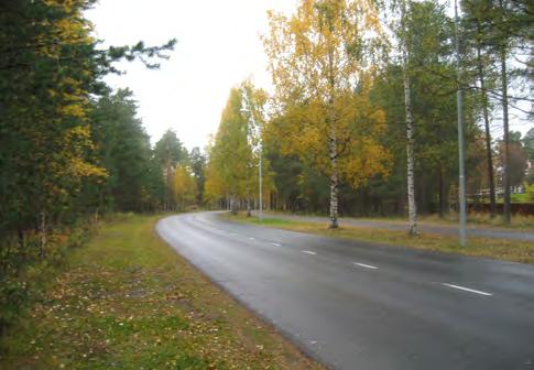 Voimakkaasti rajattu katuympäristö on myös Haulitiellä, jossa autokatosten matalat seinät reunustavat katualuetta.