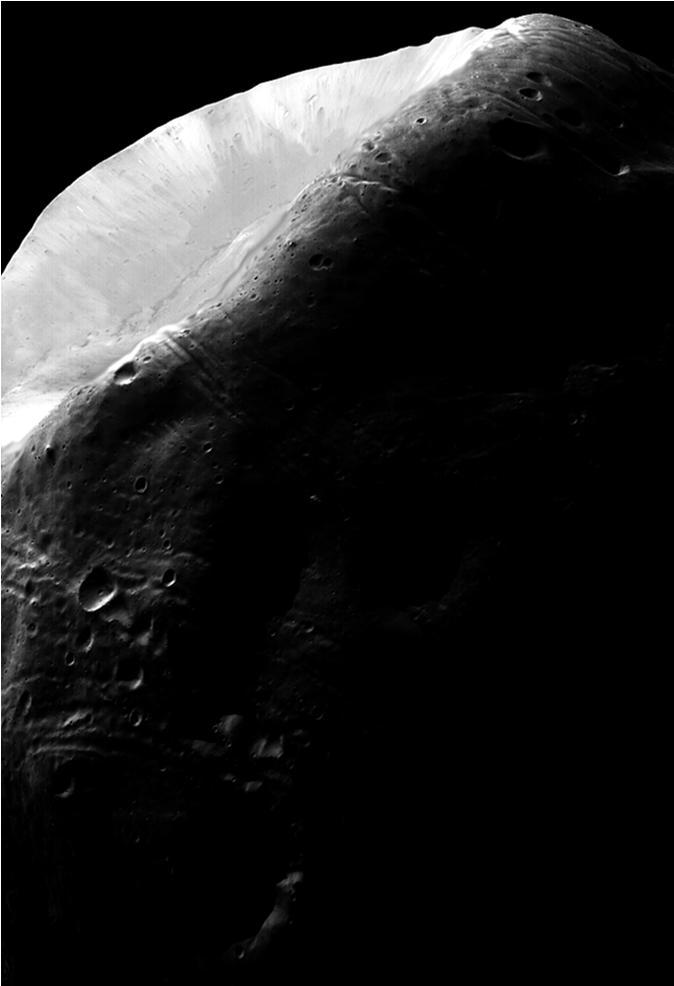 a (a) () Kuva 3.19. (a) Marsin kuun Fooksen kuva ja () tämän histogrammi (NASA). Kuva 3.21.