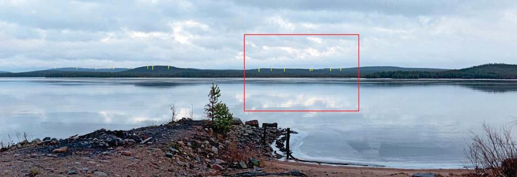 Tuulivoimalat ovat hallitsevia järvimaisemassa. Sekä roo orien lavat e ä tornit näkyvät järvenselän yli. Kuva 175.