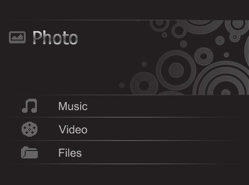 2. Liiku valikoissa painikkeilla [ ] (16) ja [ ] (19) tai [^] (11) ja [v] (12). Photo Music Video Files Käynnistä kuvaesitys tai näytä kuvat muistilta manuaalisesti. Aloita mp3-tiedostojen esitys.