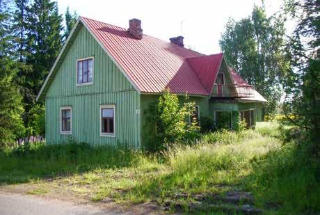 ja silti kauniista ja suomalaiseen maaseutuun sopeutuvasta talousrakentamisesta.