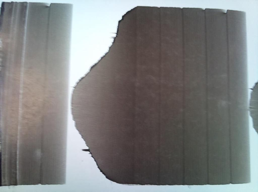 31 KUVA 8: Ensimmäinen painatusajo kartongille nippipaineella 1 bar ja kiinnirullauksen kireydellä 3,5 bar.