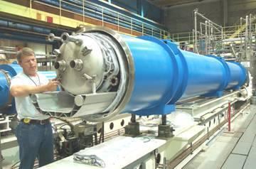 9 K cooling) 2007 expected completion Dipole magnet 7 TEV beam paths 1 TEV = 1 flying