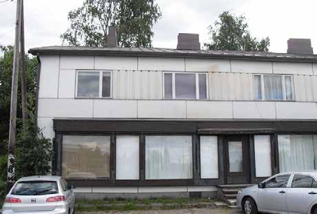 Maamiesseurantaloa vastapäätä Kauppatie 4:ssä sijaitsee 1960 ja 1974 rakennettu Osuuspankin talo, joka on tyypillistä 1960-luvun liikerakentamista.