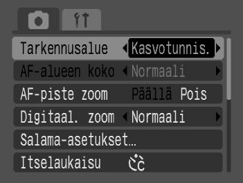 Tarkennusalueen muuttaminen Voit halutessasi siirtyä käyttämään AF (Autom.tark.) -tilaa. Kasvotunnistus Valitse [Tarkennusalue]. Paina -painiketta ja valitse 4-välilehti.